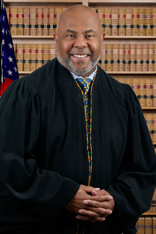 GLANVILLE, Ural  (Chief Judge)